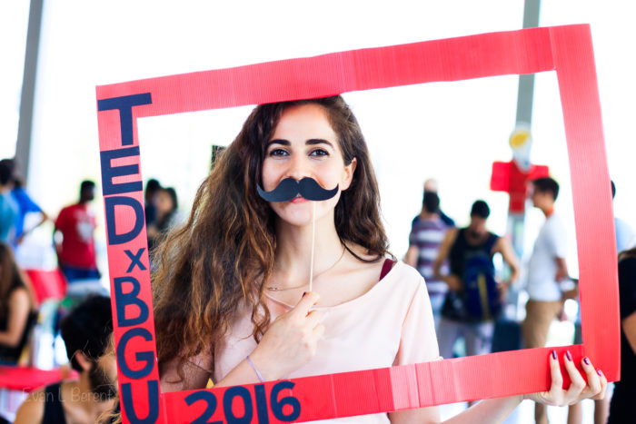 A woman poses for the camera during TedxBGU 2016