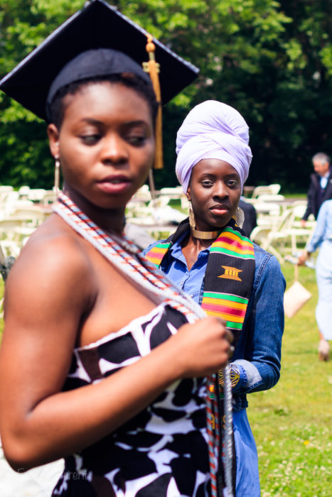 Two woman pose during a Graduation celebration